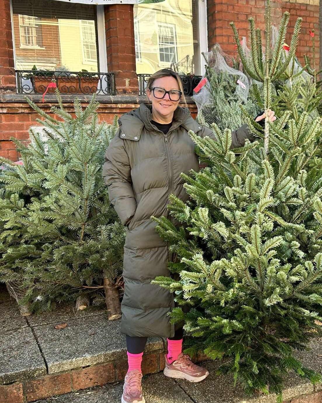Vicky, the 2024 best-dressed tree winner, collecting her free tree
